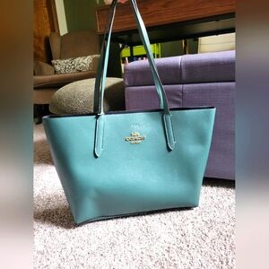 COACH (green) "City Tote" bag.